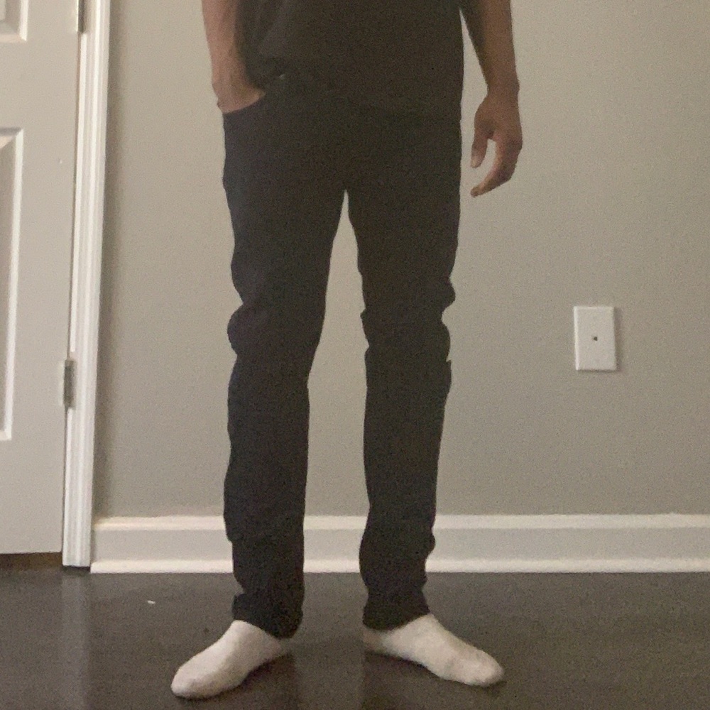 Navy blue jeans with rips, never worn